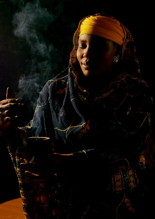 A woman taking part in a traditional spiritual practice